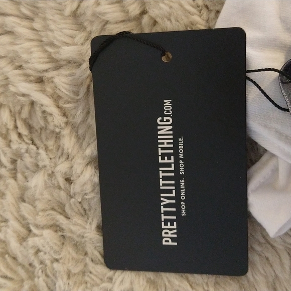 NWT. Pretty Little Things white bodysuit. - Picture 5 of 9